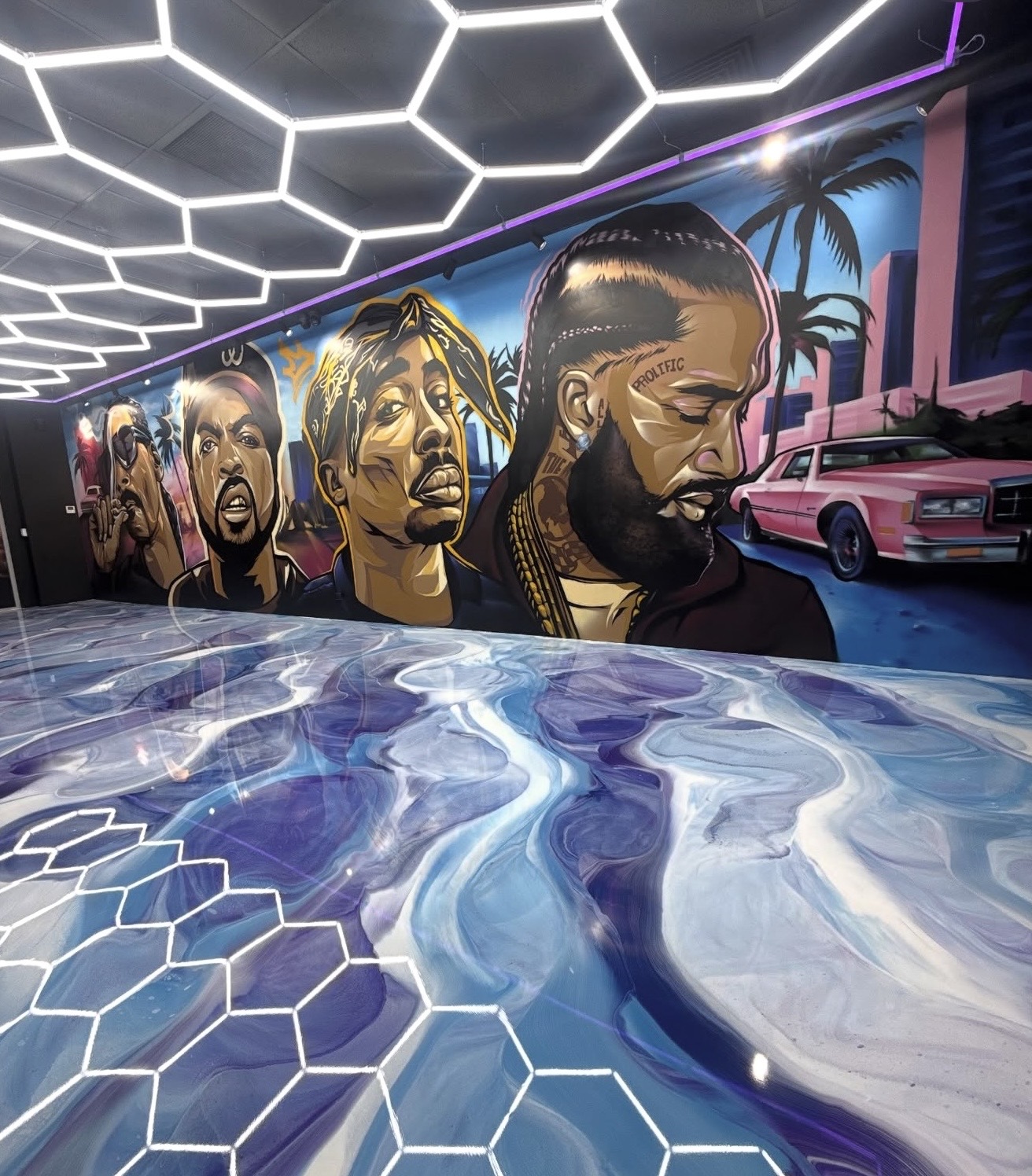 Culture Fade Barber Shop interior with hip-hop mural and hexagon LED ceiling